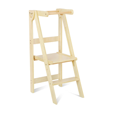 A wooden folding learning tower set up