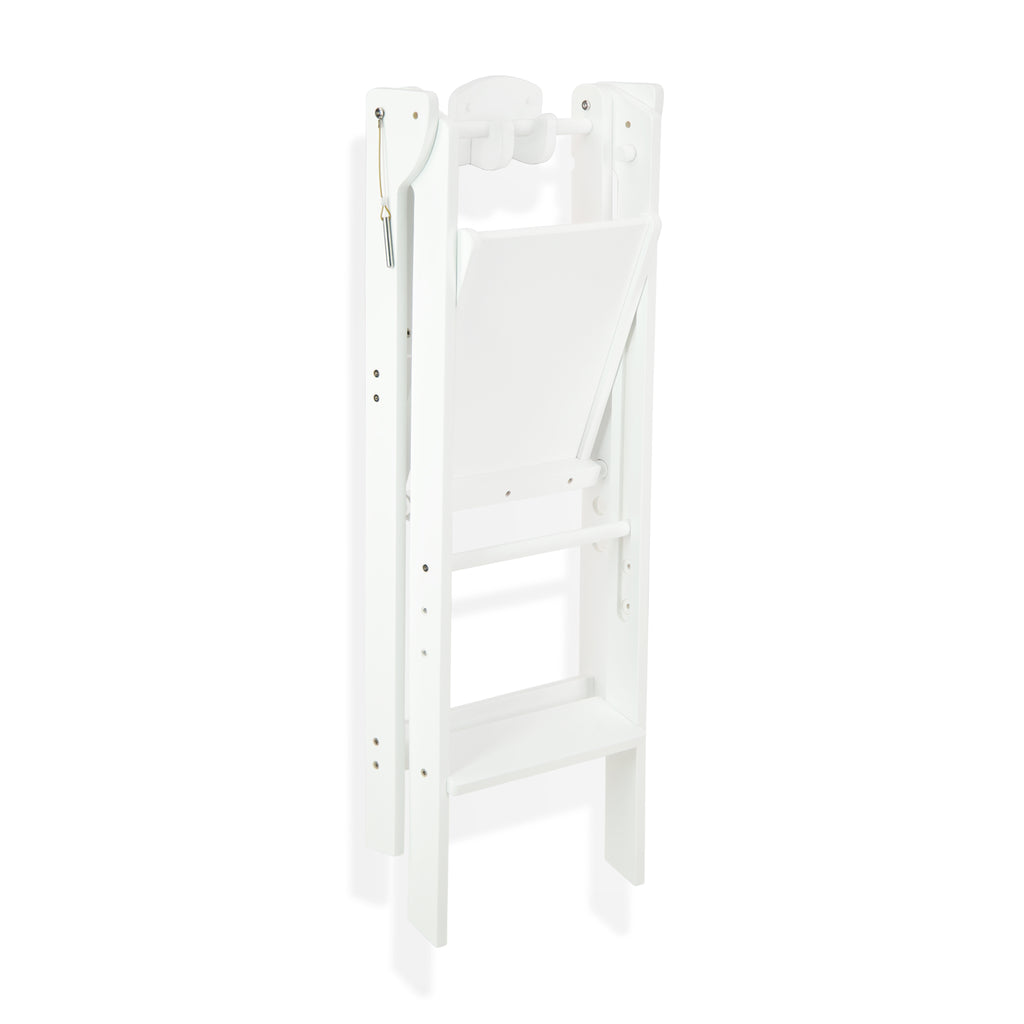 The white Fold N' Store tower mounted on a white Hook N' Store wall hook. 