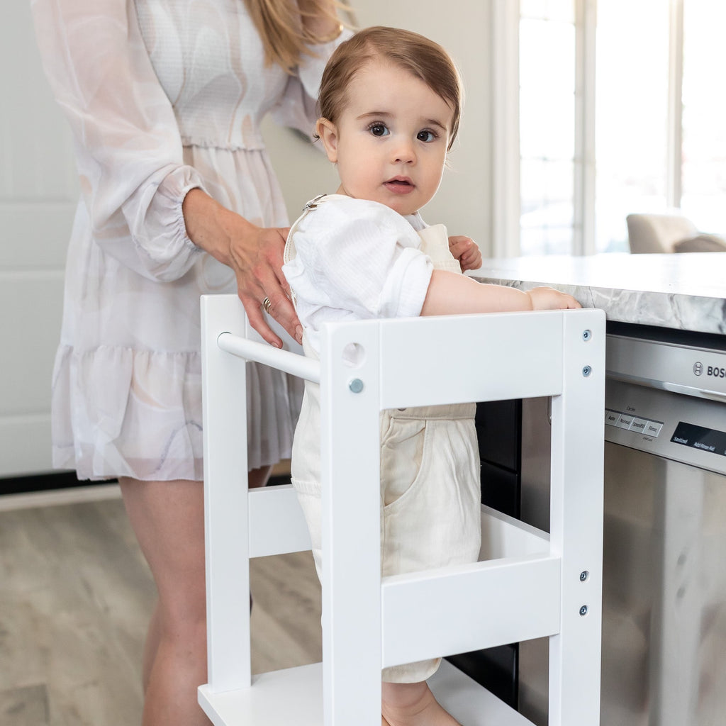 Child Standing in Clean White Color Classic Toddler Learning Tower. Kitchen Helper, Montessori Tower