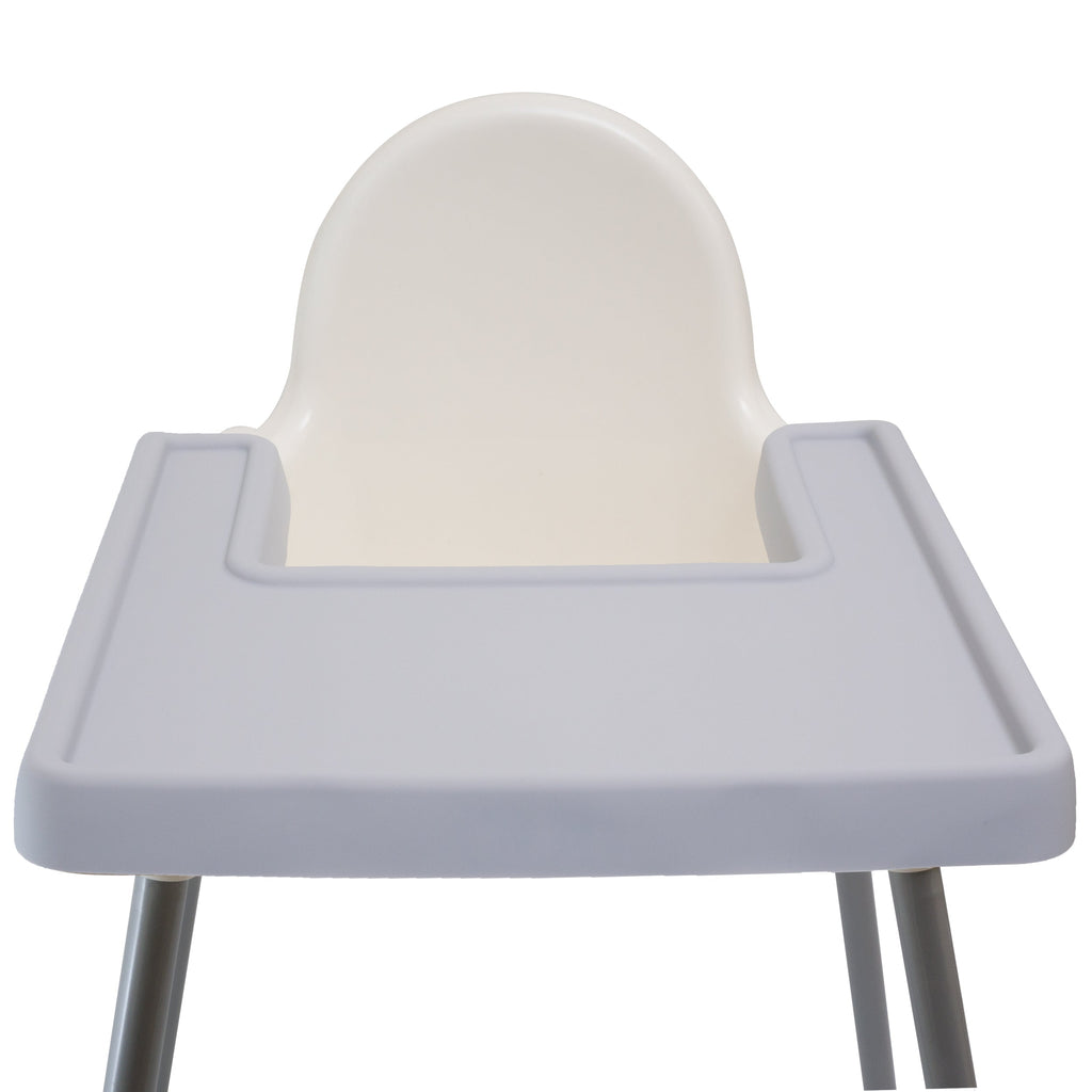 Ikea Antilop Highchair with Full Coverage Placemat Cover in Mellow Grey sits on a highchair